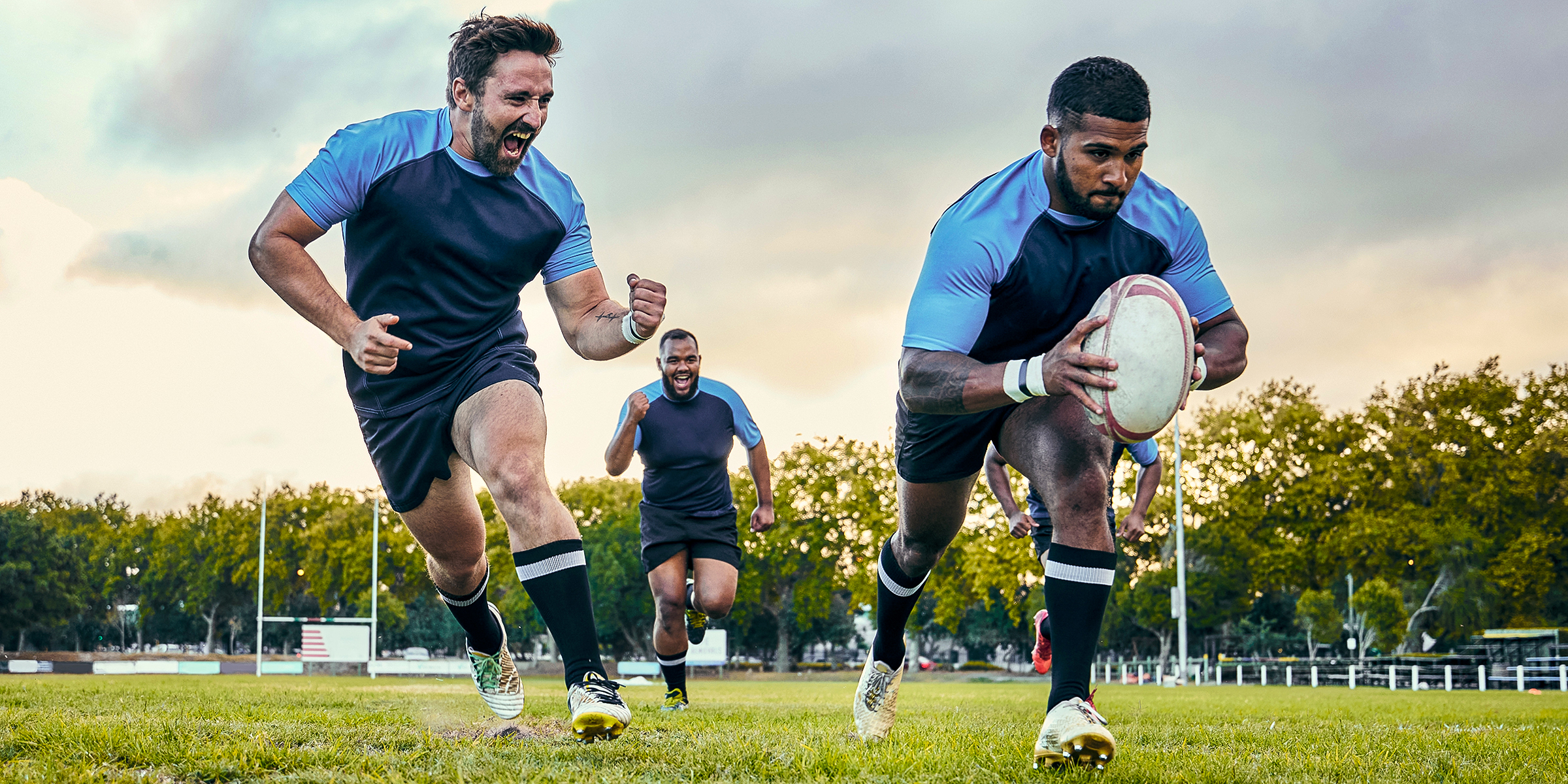 Men playing rugby | Source: Shutterstock