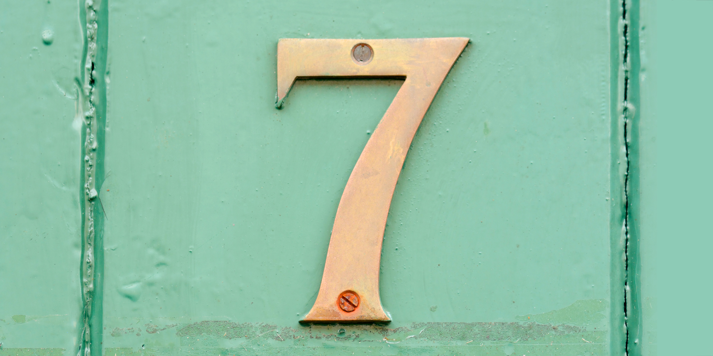 Number seven on a green background | Source: Shutterstock