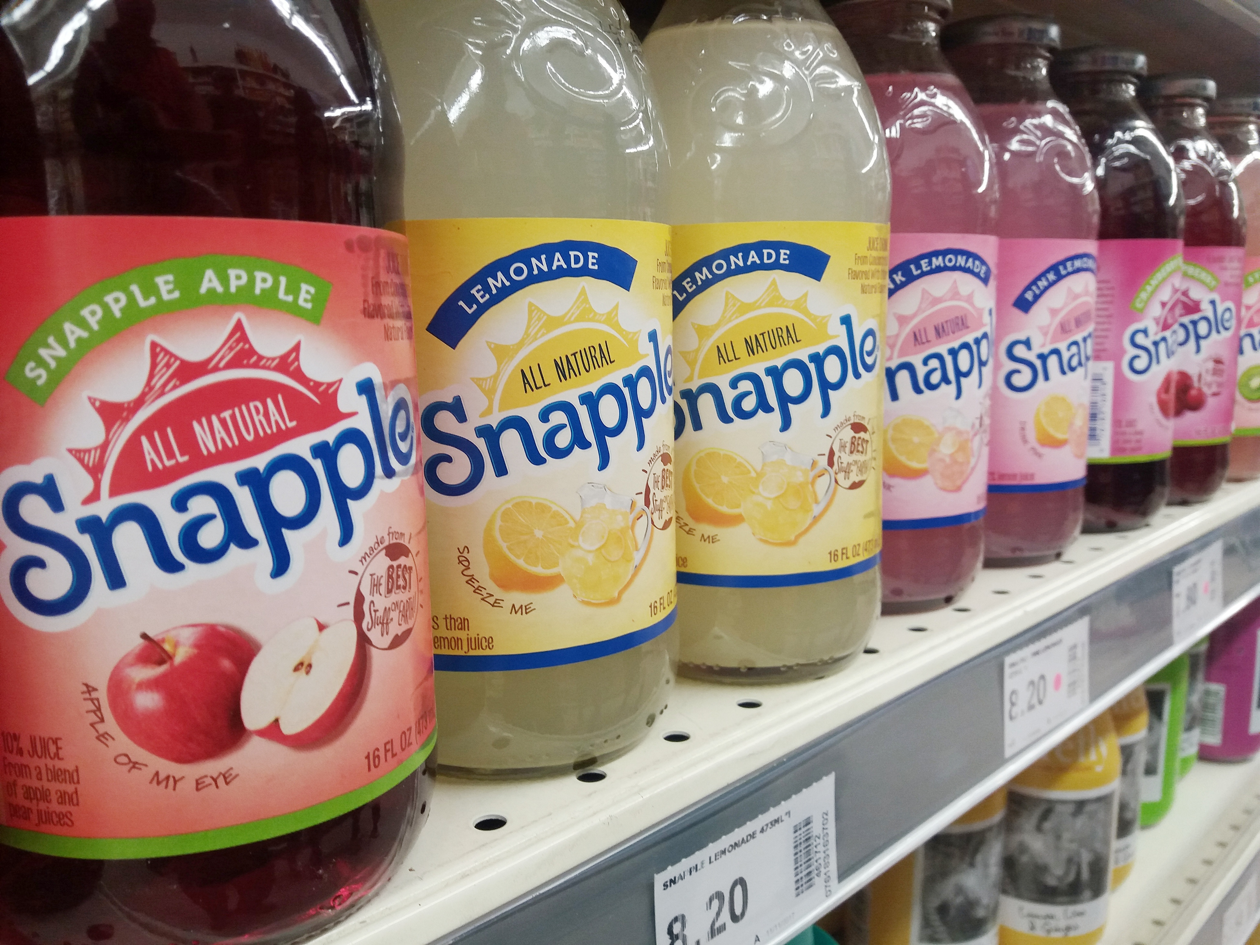 A shelf displaying various Snapple juice drinks | Source: Shutterstock