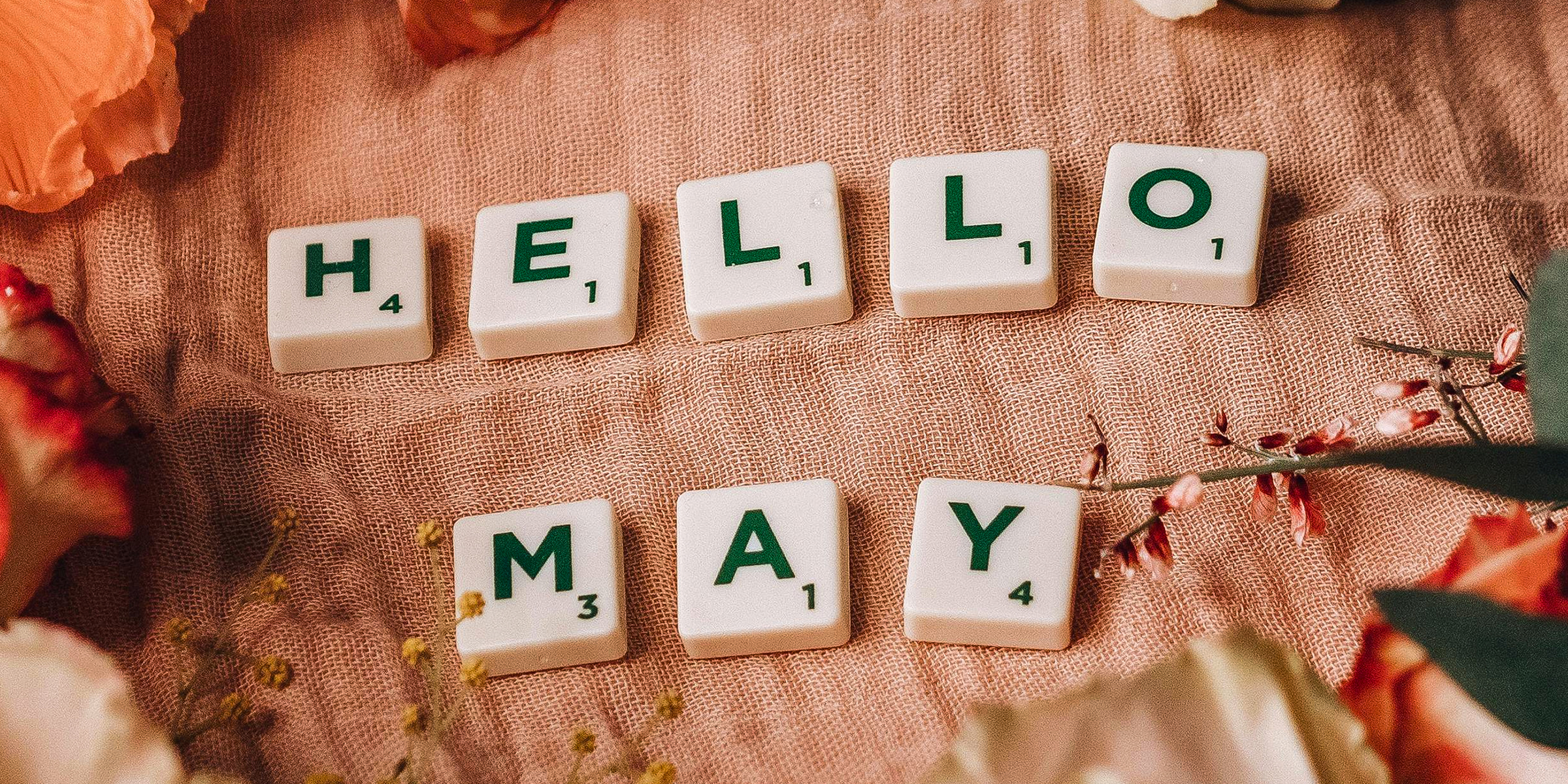 Small tiles that read "Hello May." | Source: Pexels/Polina Kovaleva